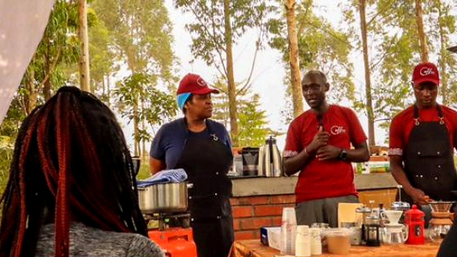 The outdoor brewing bar at a Coffee Safaris workshop, with baristas at their stations.