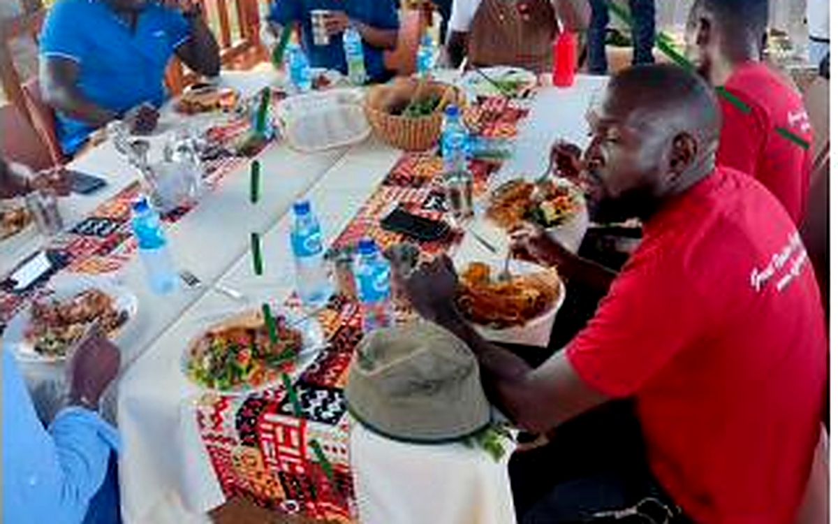 A shared table with locally prepared lunch at the close of a Coffee Safari.